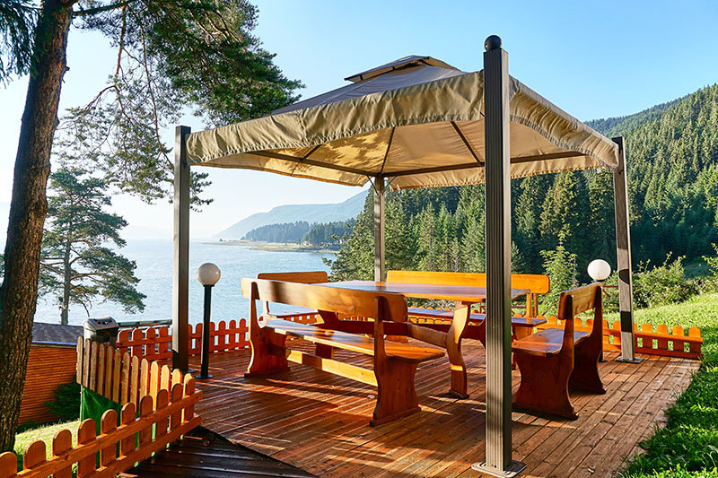 outdoor gazebo patio space with lake view